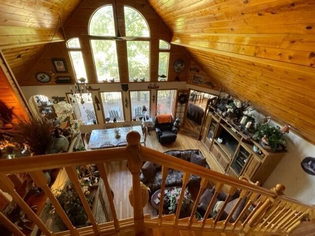 2382 Minnow Dr, Omaha, AR 72662 - living area featuring wood ceiling, wood finished floors, and high vaulted ceiling