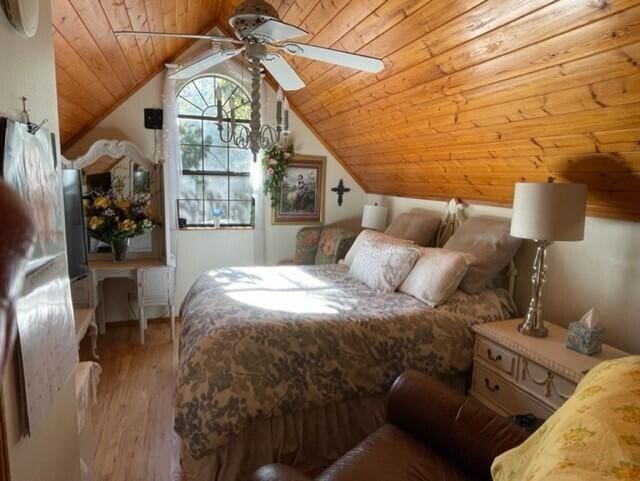 2382 Minnow Dr, Omaha, AR 72662 - bedroom featuring wooden ceiling, light wood-style floors, lofted ceiling, and a ceiling fan