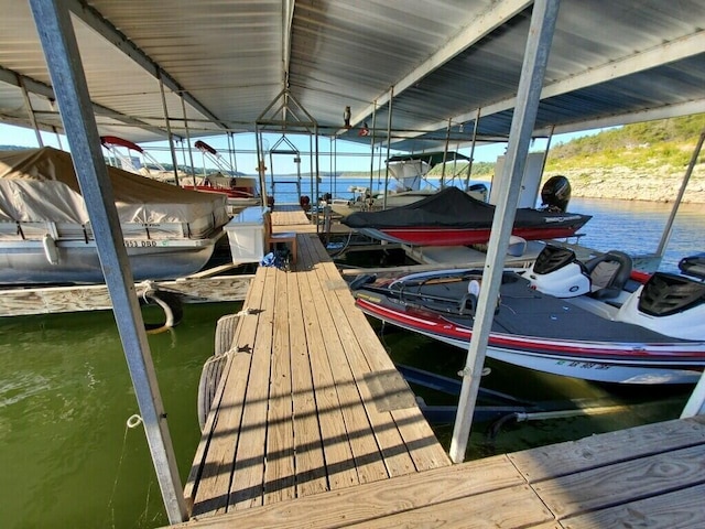 2382 Minnow Dr, Omaha, AR 72662 - dock area with boat lift and a water view