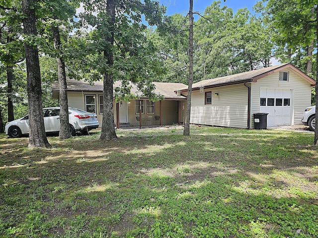 22182 County Road 288, Pittsburg, MO 65724 - view of front of house with a detached garage