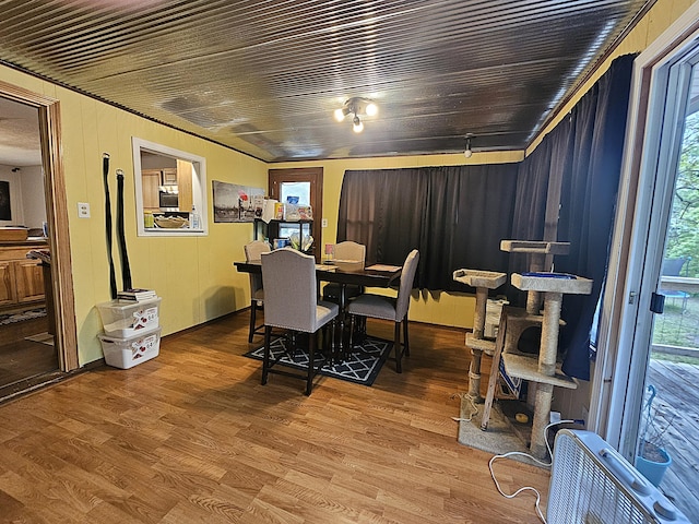 22182 County Road 288, Pittsburg, MO 65724 - dining space featuring wood finished floors
