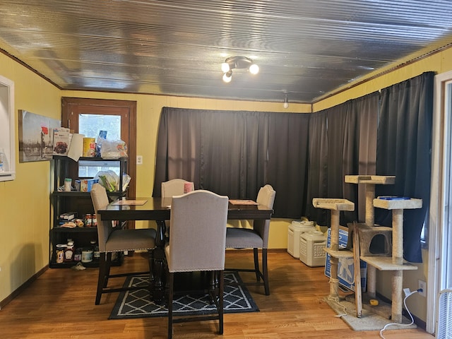 22182 County Road 288, Pittsburg, MO 65724 - dining space featuring wood finished floors, ornamental molding, wooden ceiling, and baseboards