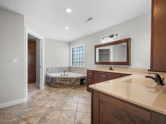 8863 Serene Acres Ln, Rogersville, MO 65742 - full bathroom featuring vanity, a bath, baseboards, and recessed lighting