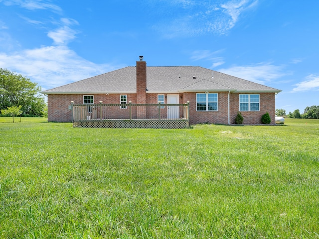 8863 Serene Acres Ln, Rogersville, MO 65742 - rear view of house featuring a wooden deck, a lawn, a chimney, and brick siding