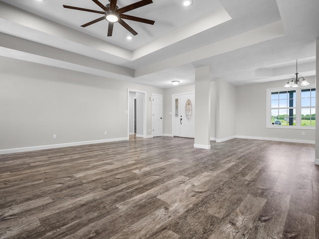 8863 Serene Acres Ln, Rogersville, MO 65742 - unfurnished living room featuring a tray ceiling, a ceiling fan, baseboards, recessed lighting, and dark wood-type flooring