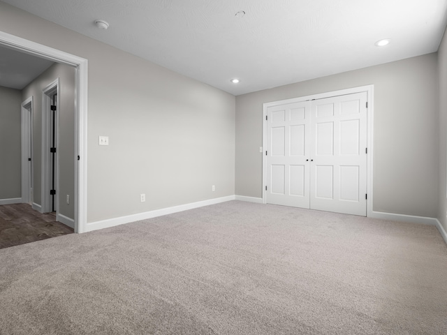 8863 Serene Acres Ln, Rogersville, MO 65742 - unfurnished bedroom featuring carpet flooring, baseboards, recessed lighting, and a closet