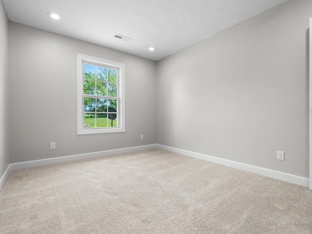 8863 Serene Acres Ln, Rogersville, MO 65742 - spare room with light colored carpet, baseboards, and recessed lighting