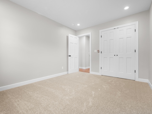 8863 Serene Acres Ln, Rogersville, MO 65742 - unfurnished bedroom featuring carpet floors, baseboards, recessed lighting, and a closet