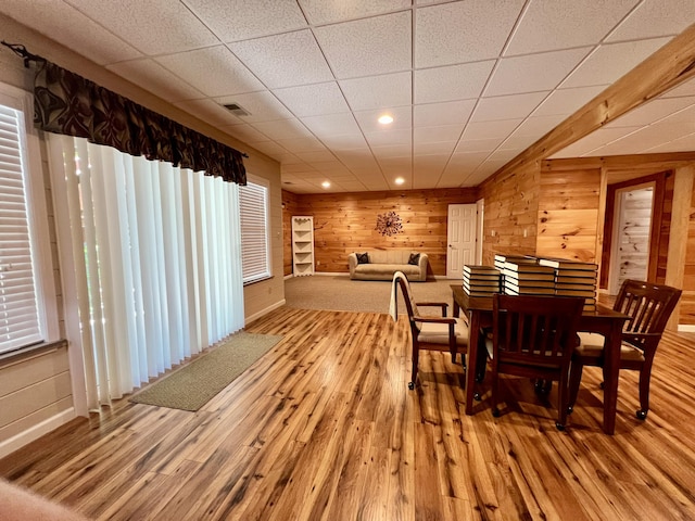 1207 Ledgestone Cir, Branson West, MO 65737 - dining space featuring hardwood / wood-style flooring, wood walls, baseboards, and recessed lighting