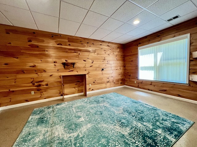 1207 Ledgestone Cir, Branson West, MO 65737 - spare room with baseboards, wooden walls, and carpet
