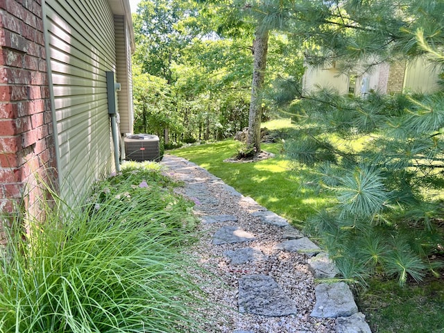 1207 Ledgestone Cir, Branson West, MO 65737 - view of green lawn with central AC