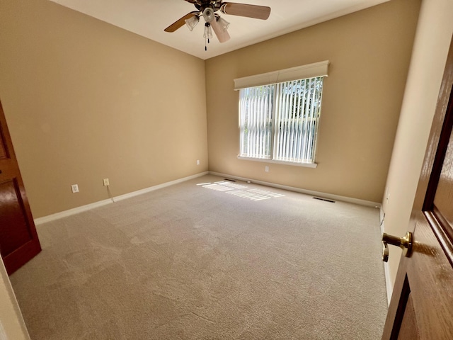 1207 Ledgestone Cir, Branson West, MO 65737 - spare room featuring a ceiling fan, baseboards, and carpet