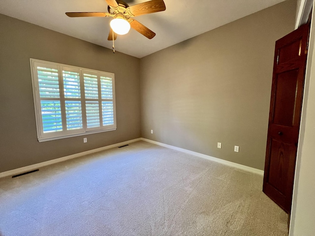 1207 Ledgestone Cir, Branson West, MO 65737 - carpeted spare room featuring baseboards and a ceiling fan
