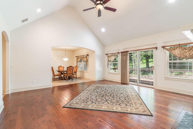 903 Silver Bluff Cir, Branson West, MO 65737 - living area with arched walkways, high vaulted ceiling, a ceiling fan, wood-type flooring, and baseboards