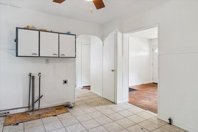 1823 W Olive St, Springfield, MO 65802 - laundry room featuring cabinet space, ceiling fan, electric dryer hookup, arched walkways, and hookup for a washing machine