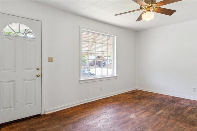 1823 W Olive St, Springfield, MO 65802 - entryway with plenty of natural light, wood finished floors, ceiling fan, and baseboards
