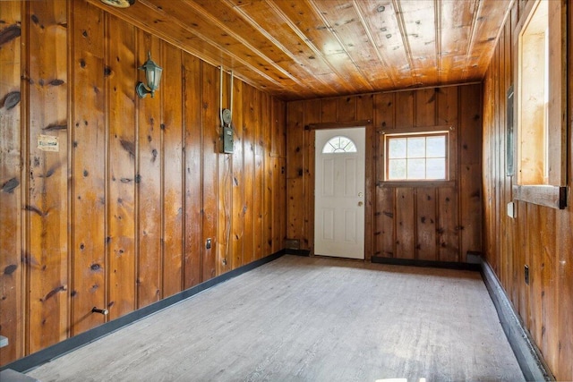 1823 W Olive St, Springfield, MO 65802 - entrance foyer featuring wood finished floors, wooden ceiling, wooden walls, and baseboards