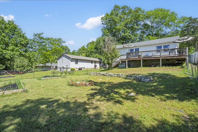 305 Cliff Dr, Branson, MO 65616 - view of yard with a vegetable garden, a deck, and stairway