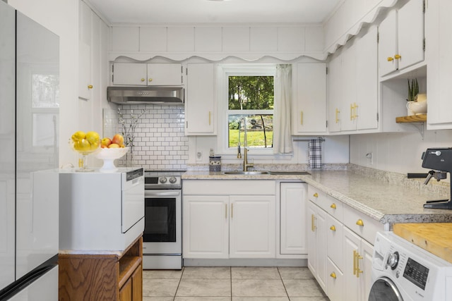 305 Cliff Dr, Branson, MO 65616 - kitchen with electric stove, washer / dryer, refrigerator, under cabinet range hood, and open shelves