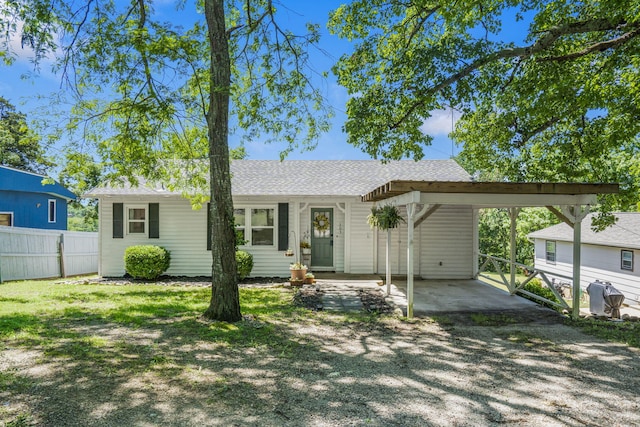 305 Cliff Dr, Branson, MO 65616 - single story home with driveway and roof with shingles