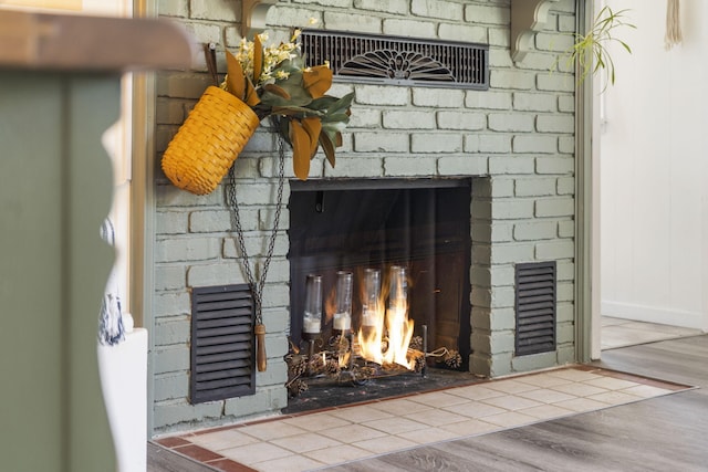 305 Cliff Dr, Branson, MO 65616 - detailed view of a fireplace and wood finished floors