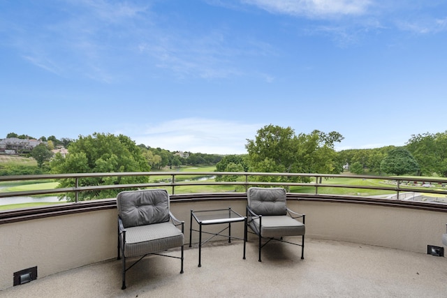 5575 S Castlebay Dr, Springfield, MO 65809 - view of patio featuring a balcony, a water view, and view of scattered trees