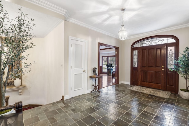 5575 S Castlebay Dr, Springfield, MO 65809 - foyer featuring stone tile floors, baseboards, and crown molding