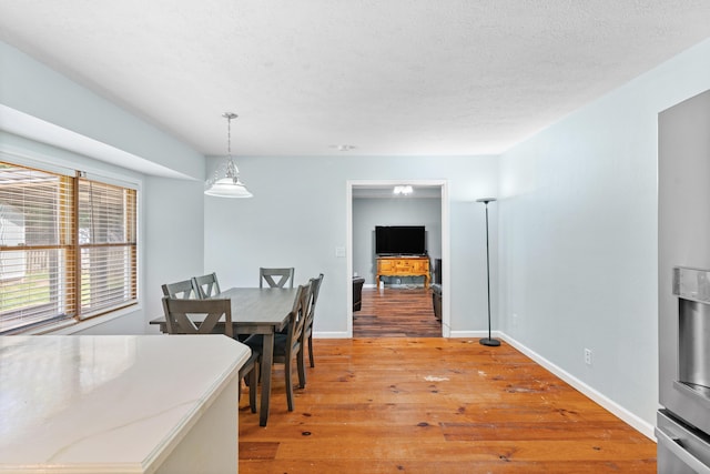 3645 S Ridgecrest Ave, Springfield, MO 65807 - dining area with light wood finished floors and baseboards