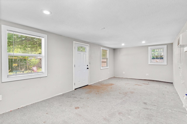 3645 S Ridgecrest Ave, Springfield, MO 65807 - entryway with healthy amount of natural light, a textured ceiling, and recessed lighting