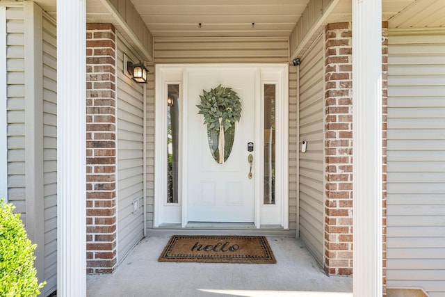 181 Rosewood Ln, Branson, MO 65616 - doorway to property with brick siding