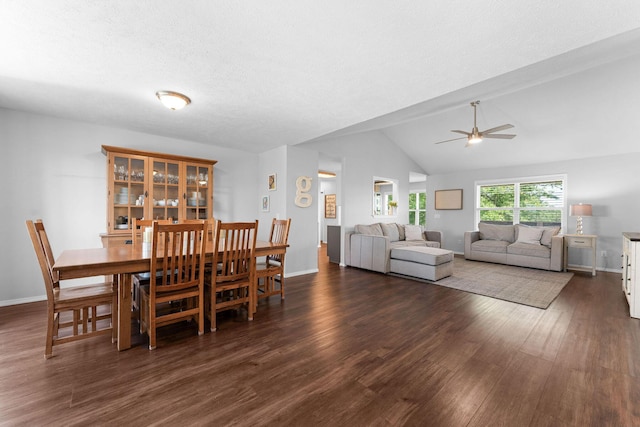 181 Rosewood Ln, Branson, MO 65616 - dining room featuring a ceiling fan, dark wood-style floors, vaulted ceiling, baseboards, and a textured ceiling