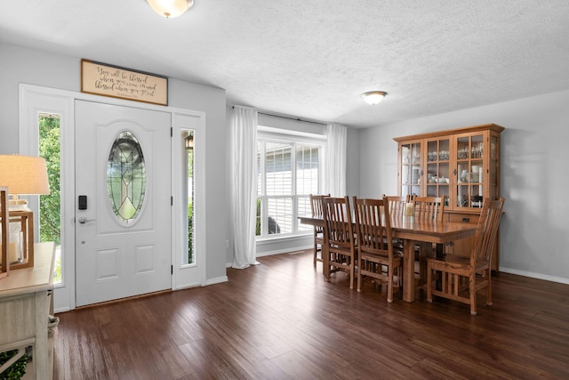 181 Rosewood Ln, Branson, MO 65616 - foyer entrance featuring wood finished floors, baseboards, and a textured ceiling