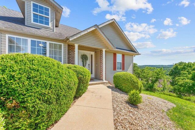 181 Rosewood Ln, Branson, MO 65616 - property entrance featuring a shingled roof