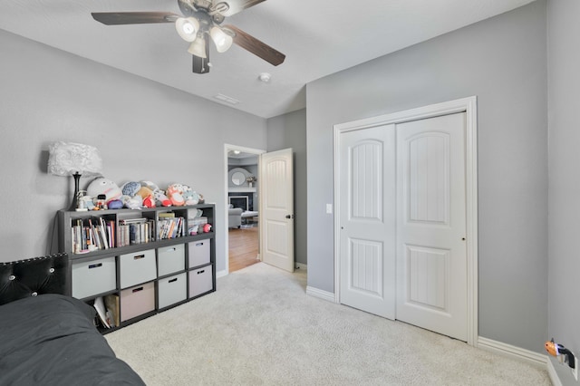 3192 W Melbourne St, Springfield, MO 65810 - bedroom featuring carpet, a closet, baseboards, and a ceiling fan