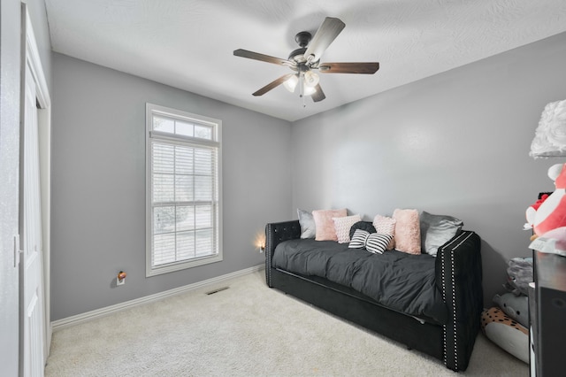 3192 W Melbourne St, Springfield, MO 65810 - bedroom with carpet flooring, baseboards, and ceiling fan