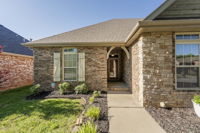 3192 W Melbourne St, Springfield, MO 65810 - entrance to property featuring a shingled roof and brick siding