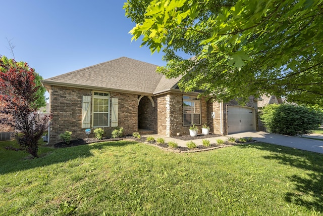 3192 W Melbourne St, Springfield, MO 65810 - view of front of home with driveway, a front yard, brick siding, a shingled roof, and an attached garage