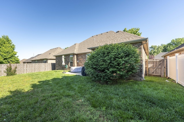 3192 W Melbourne St, Springfield, MO 65810 - rear view of house with brick siding and a shingled roof