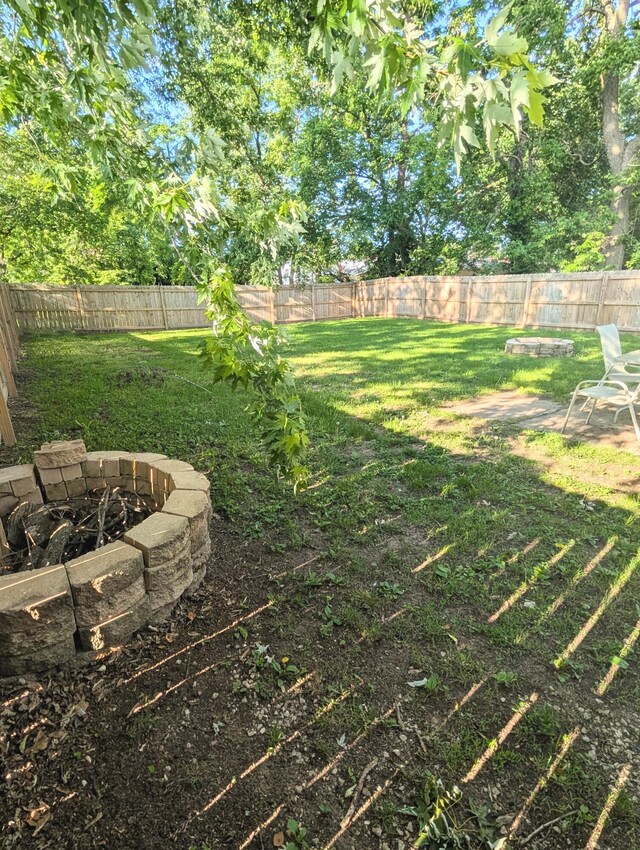204 E College St, Walnut Grove, MO 65770 - view of yard featuring an outdoor fire pit