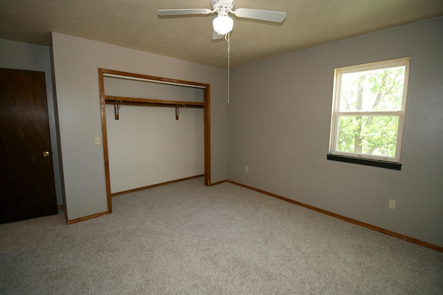 360 Banning St, Marshfield, MO 65706 - unfurnished bedroom with light colored carpet, baseboards, a closet, and a ceiling fan