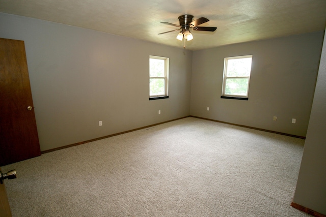 360 Banning St, Marshfield, MO 65706 - unfurnished room with ceiling fan, light carpet, and baseboards