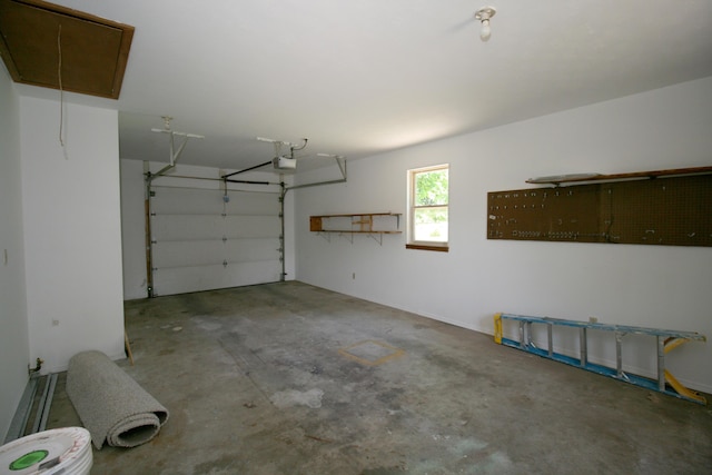 360 Banning St, Marshfield, MO 65706 - garage featuring a garage door opener