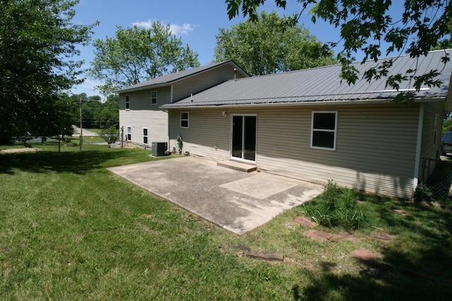 360 Banning St, Marshfield, MO 65706 - back of property featuring central air condition unit, a patio, and metal roof