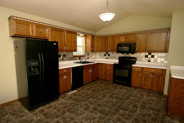 360 Banning St, Marshfield, MO 65706 - kitchen with black appliances, a sink, brown cabinets, decorative backsplash, and vaulted ceiling