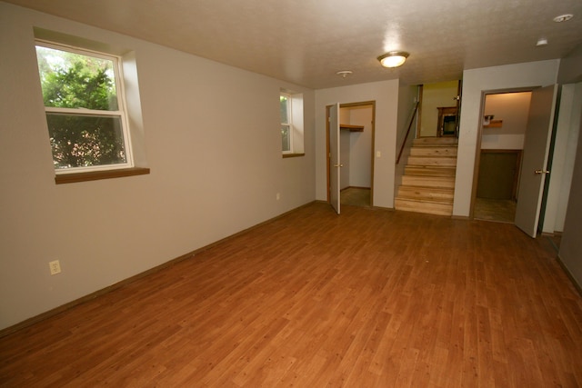 360 Banning St, Marshfield, MO 65706 - unfurnished room with wood finished floors and stairway
