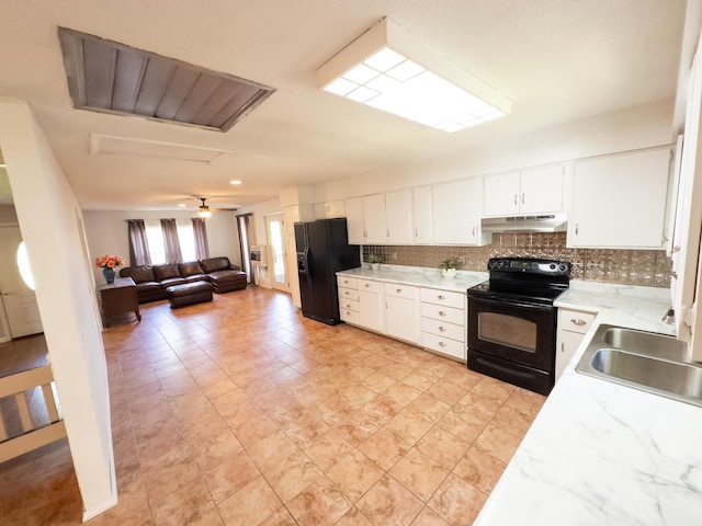 4095 Bell Springs Rd, Marshfield, MO 65706 - kitchen featuring black appliances, under cabinet range hood, a sink, tasteful backsplash, and open floor plan