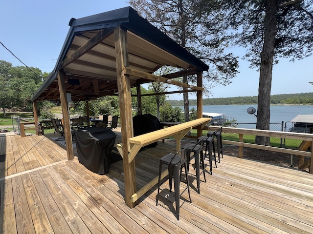21937 Lake Rd Unit M12, Cassville, MO 65625 - wooden deck with a water view and outdoor dining area