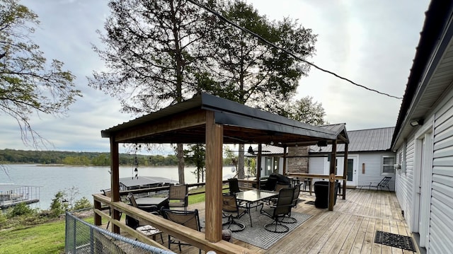 21937 Lake Rd Unit M12, Cassville, MO 65625 - deck with outdoor dining space and a water view