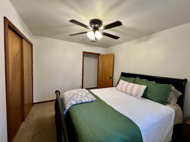 21937 Lake Rd Unit M12, Cassville, MO 65625 - carpeted bedroom with a closet, ceiling fan, and baseboards