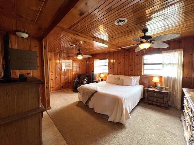 21937 Lake Rd Unit M12, Cassville, MO 65625 - bedroom featuring multiple windows, wooden walls, light carpet, ceiling fan, and light tile patterned floors